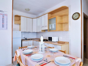 Pleasant holiday home in Rosolina Mare with a garden